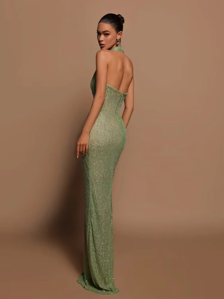 Selvara – Green sequin dress with open back and halter neckline