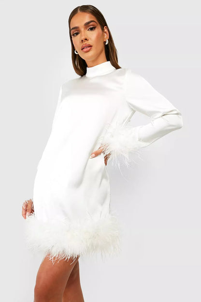 Hanne - Playful Mini Dress with Feather Accent